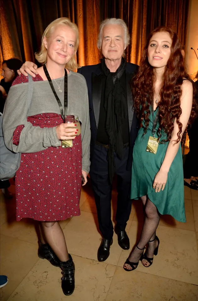 Rock ‘n’ roll love story: Jimmy Page, 73, and much younger girlfriend Scarlett Sabet, 26, cosy up at Pink Floyd exhibition launch in London