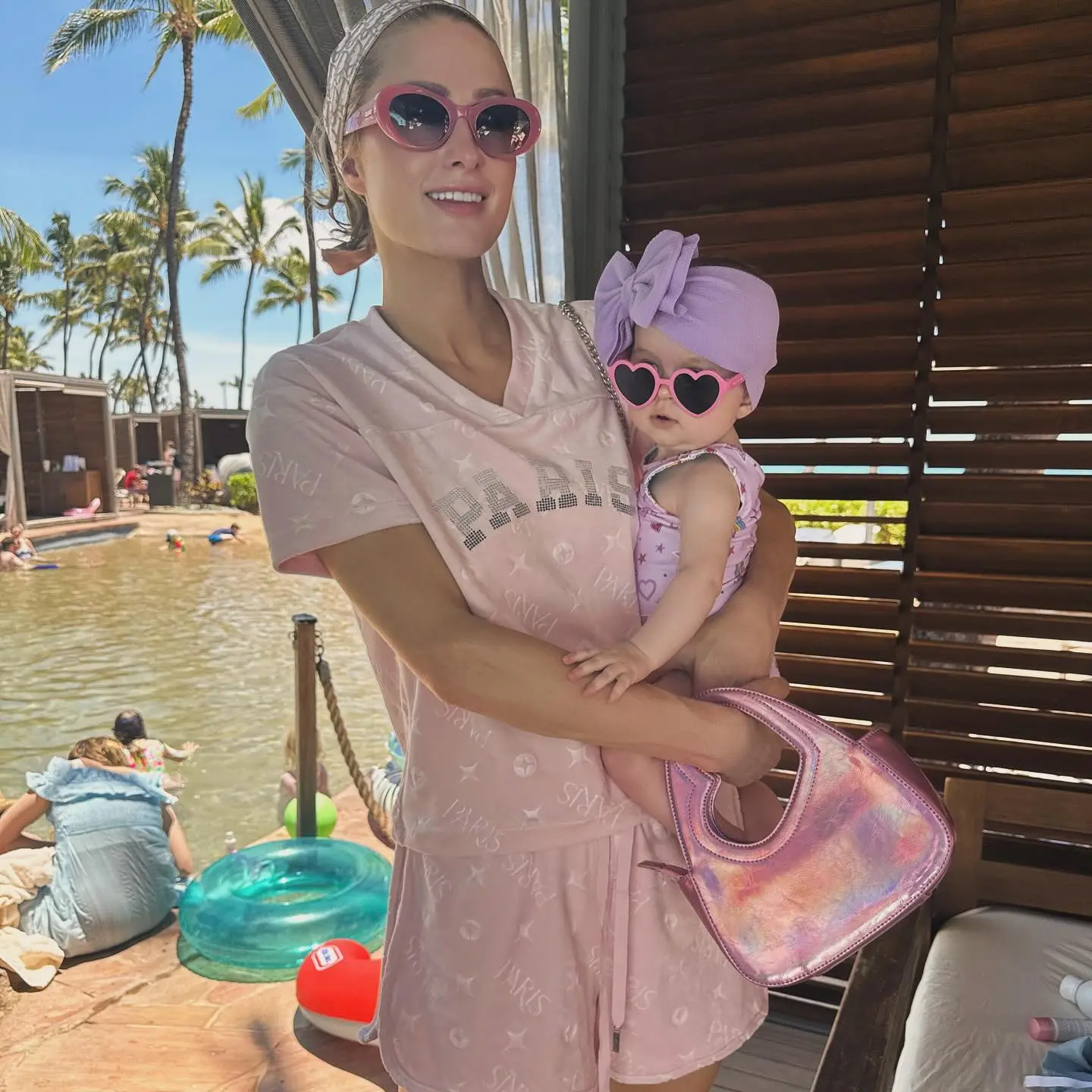 Paris Hilton and daughter London, 6 months, match in pink during family vacation to Hawaii