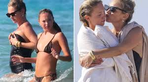 Kate Moss, 50, hugs model daughter Lila and can’t stop laughing as they soak up the sun in Ibiza