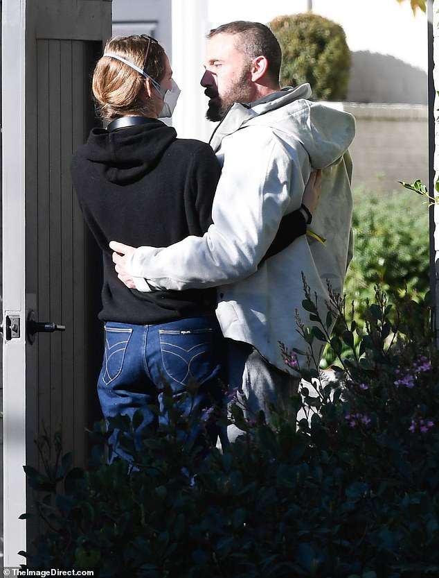 As the deadly LA fires continue to burn, Ben Affleck sweetly hugs daughter Violet, 19, at his home in Brentwood as they mourn the death of their…